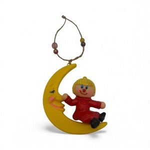 Vintage Sleepy half moon and doll ornament Hong Kong plastic mold 4.5" yellow